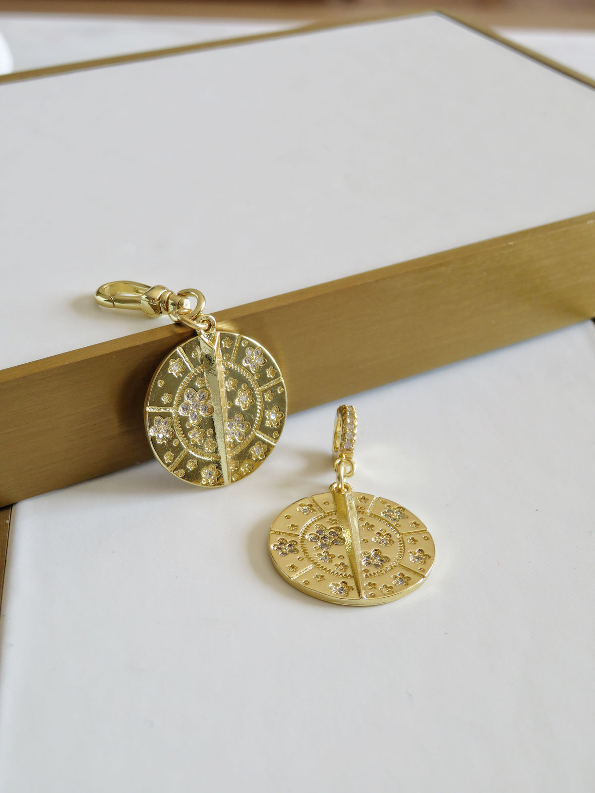 Blossoms with Thorn Sundial Charm on Diamond Hinged Clasp