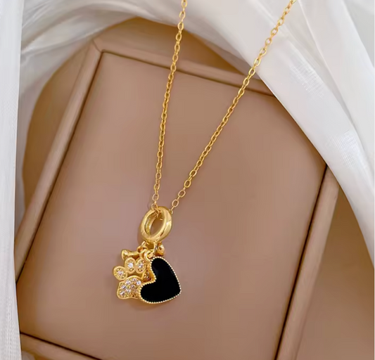 Gold puppy paw and heart charm necklace